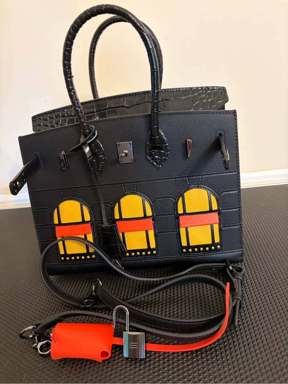 Black Women's Vegan Leather Top-Handle Bag with Yellow & Orange Window Accents